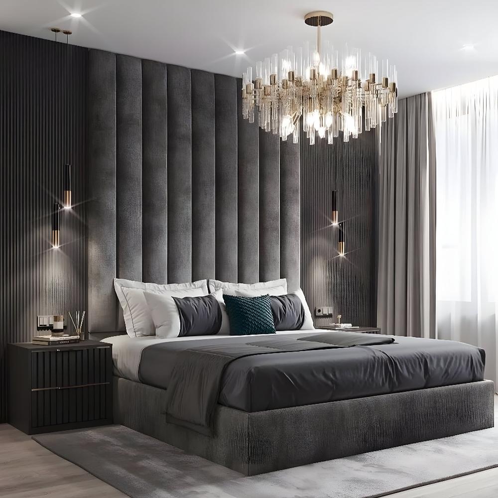 Modern bedroom with a bed, dark textured headboard with light, and chandelier.