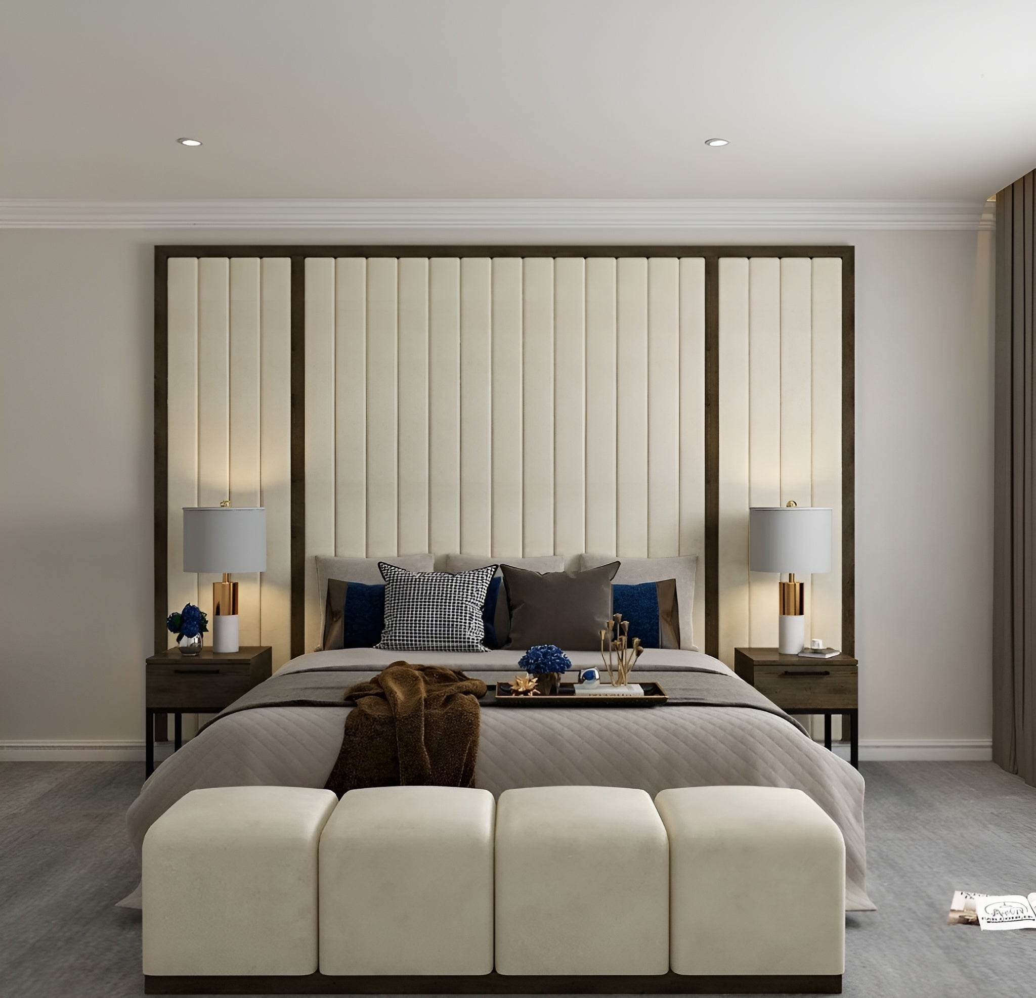 Modern bedroom with large single murphy bed, tall paneled headboard, decorative pillows, and matching nightstands with lamps.