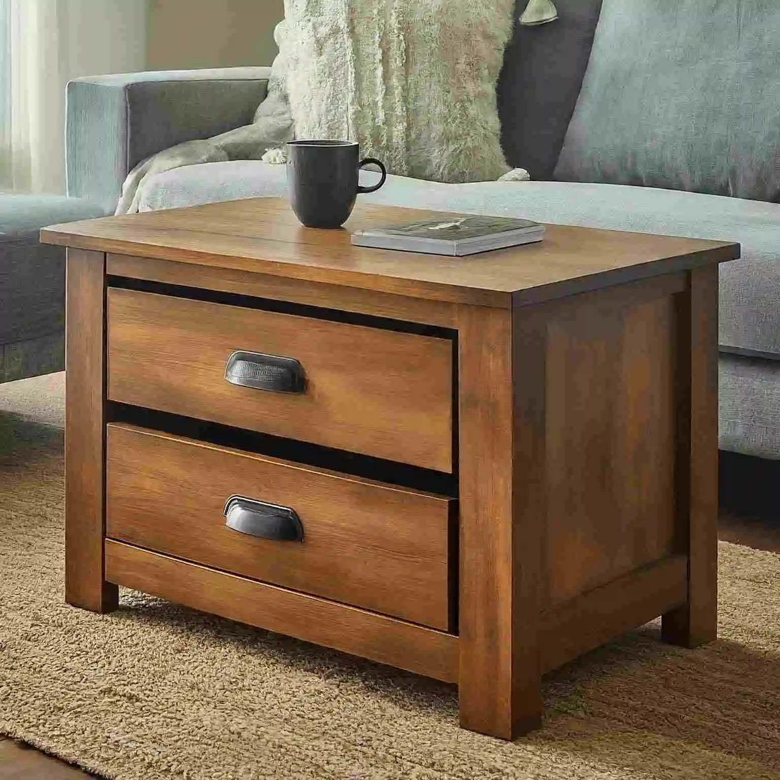 Wooden coffee table with storage drawers a centerpiece in living room.