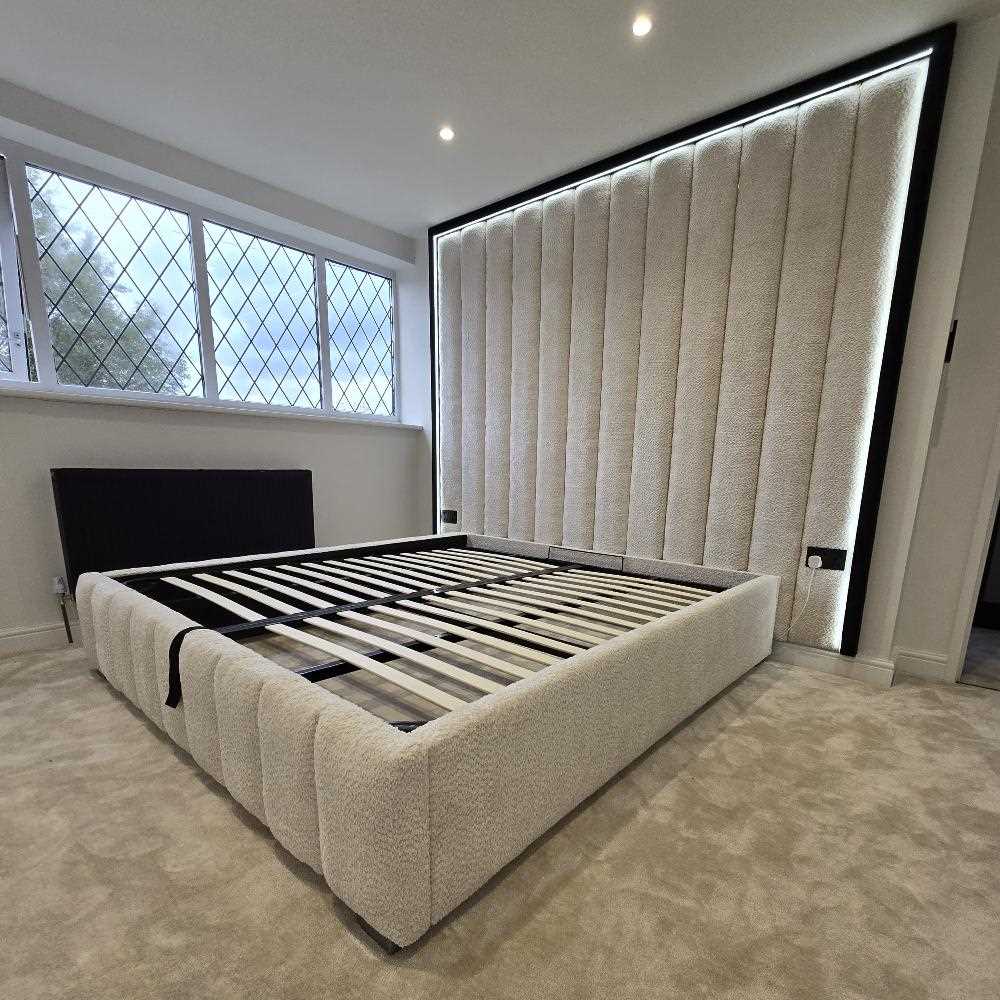 A bedroom with a Modern Upholstered Wall Panel Bed with LED Back light, and diamond-patterned window.