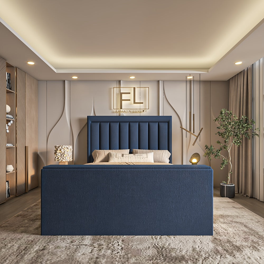 A bedroom featuring a blue upholstered Linza TV bed frame with hanging lights, a decorative wall panel, and a bookshelf.